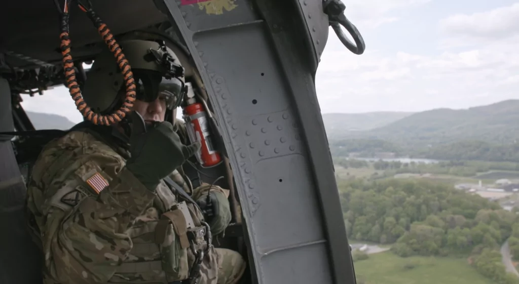 Soldier in helicopter